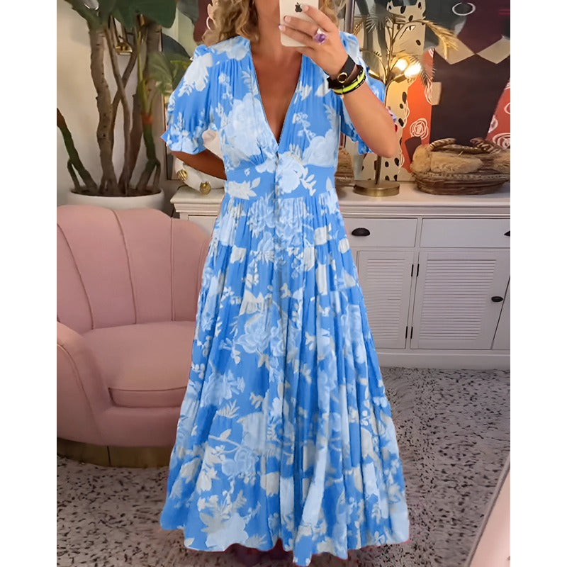 Carine™ | Blomsterprintet lommekjole med V-hals