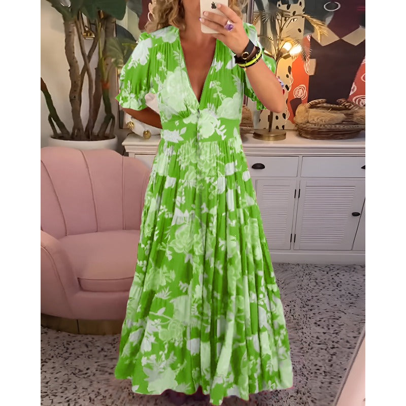 Carine™ | Blomsterprintet lommekjole med V-hals