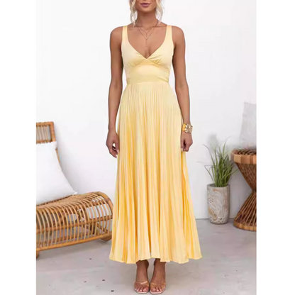 Aby - Gul maxikjole med plisseret V-udskæring