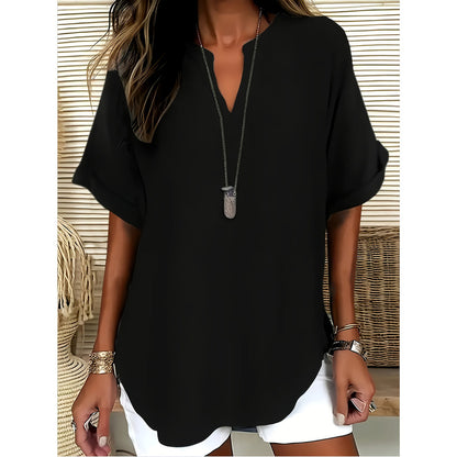 Elegant ensfarvet bluse