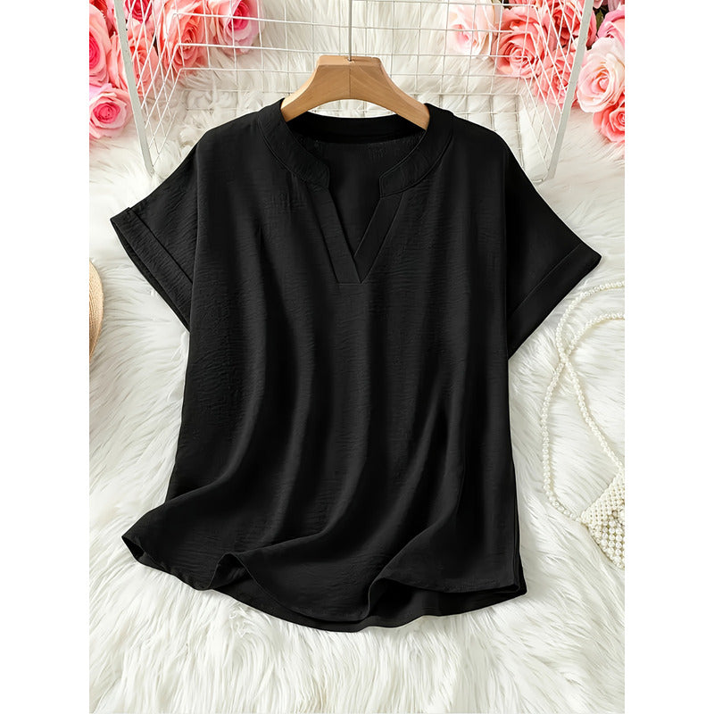 Elegant ensfarvet bluse