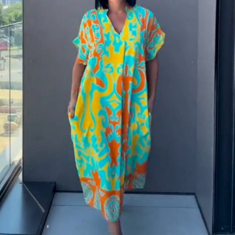 Afslappet elegant printet kjole med V-hals til kvinder