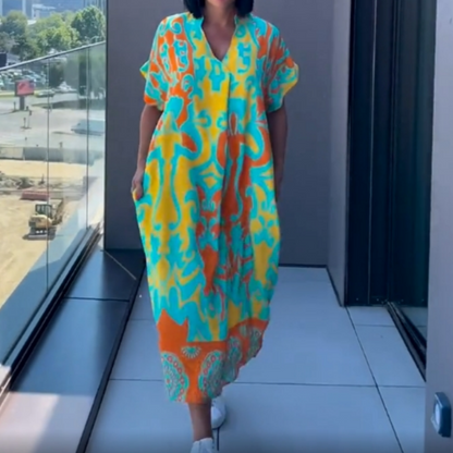 Afslappet elegant printet kjole med V-hals til kvinder